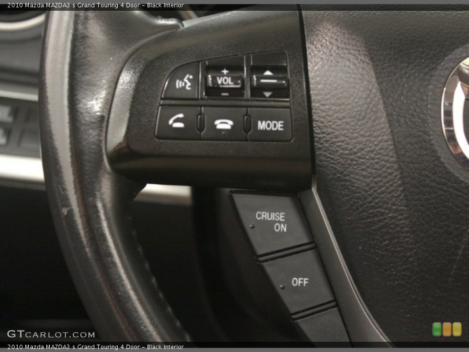 Black Interior Controls for the 2010 Mazda MAZDA3 s Grand Touring 4 Door #67621239
