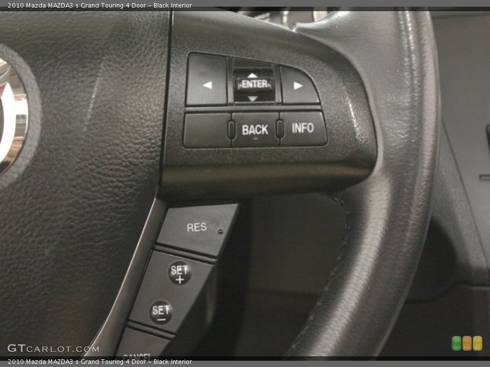 Black Interior Controls for the 2010 Mazda MAZDA3 s Grand Touring 4 Door #67621248