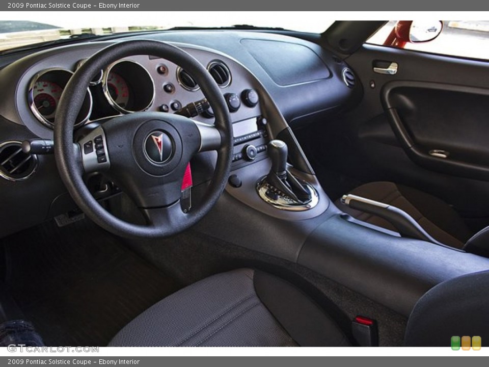 Ebony Interior Prime Interior for the 2009 Pontiac Solstice Coupe #67654189