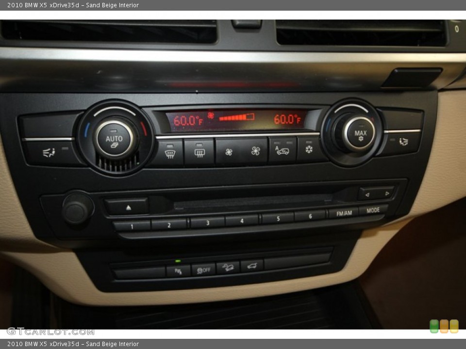 Sand Beige Interior Controls for the 2010 BMW X5 xDrive35d #67654621