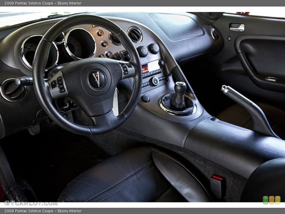 Ebony Interior Prime Interior for the 2009 Pontiac Solstice Coupe #67655335