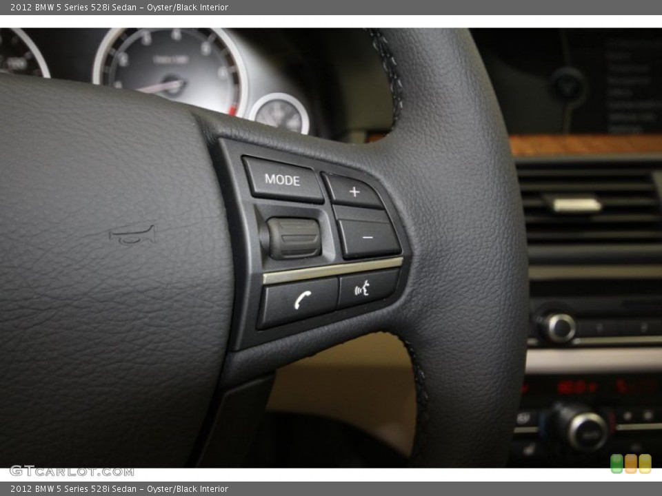 Oyster/Black Interior Controls for the 2012 BMW 5 Series 528i Sedan #67661617