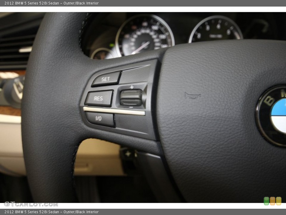Oyster/Black Interior Controls for the 2012 BMW 5 Series 528i Sedan #67661623