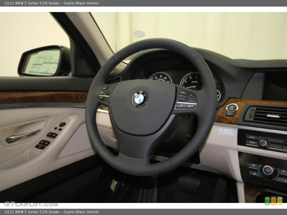 Oyster/Black Interior Steering Wheel for the 2012 BMW 5 Series 528i Sedan #67661647