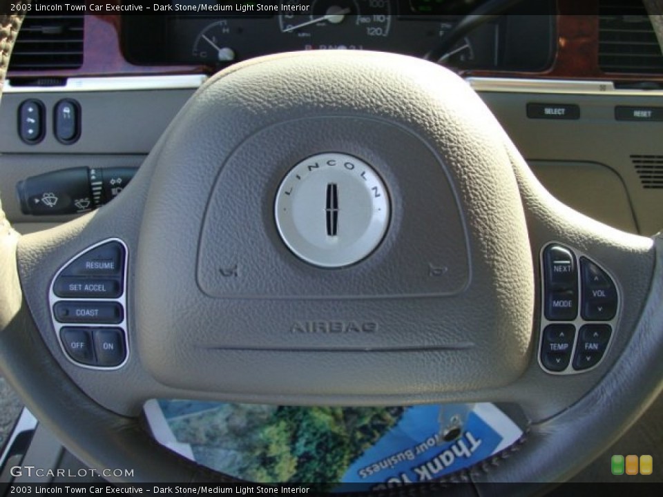 Dark Stone/Medium Light Stone Interior Controls for the 2003 Lincoln Town Car Executive #67673989