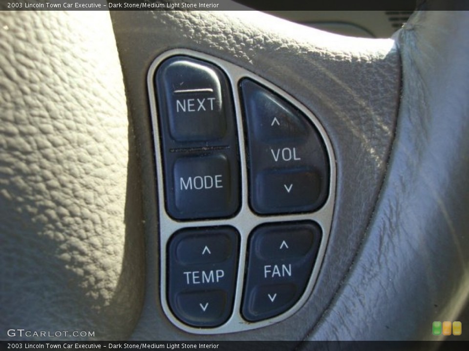 Dark Stone/Medium Light Stone Interior Controls for the 2003 Lincoln Town Car Executive #67673998