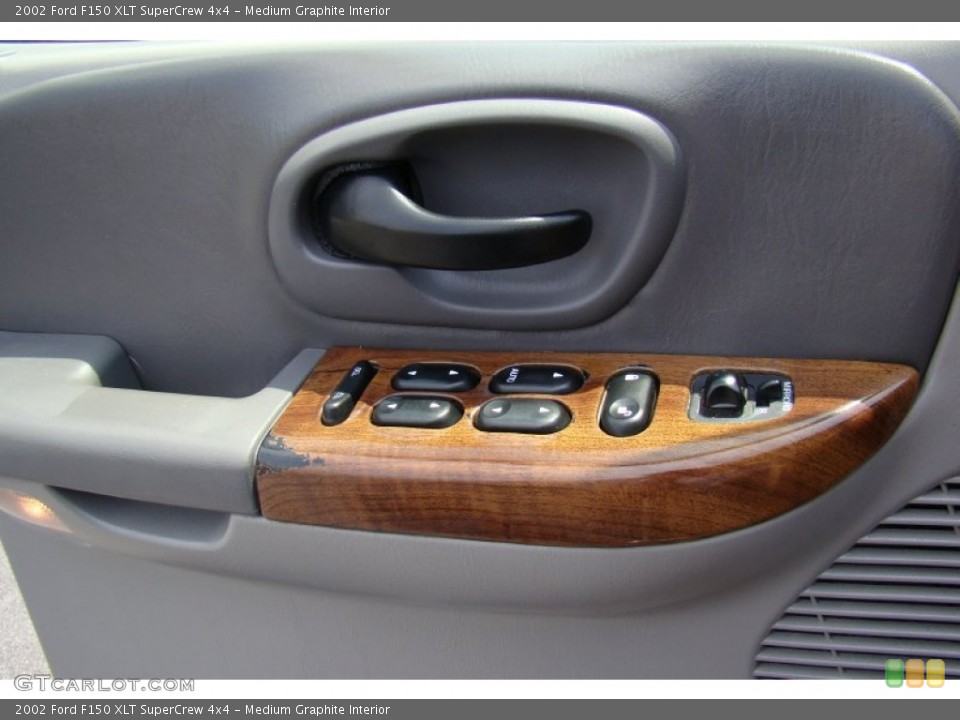 Medium Graphite Interior Controls for the 2002 Ford F150 XLT SuperCrew 4x4 #67674754
