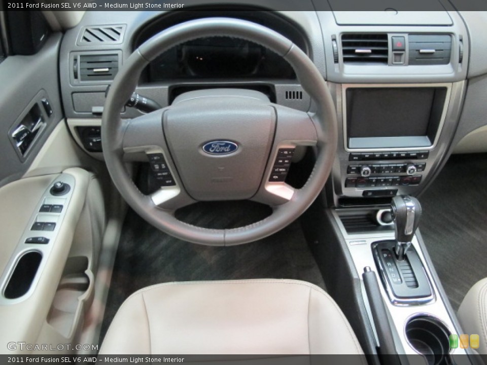 Medium Light Stone Interior Dashboard for the 2011 Ford Fusion SEL V6 AWD #67681018