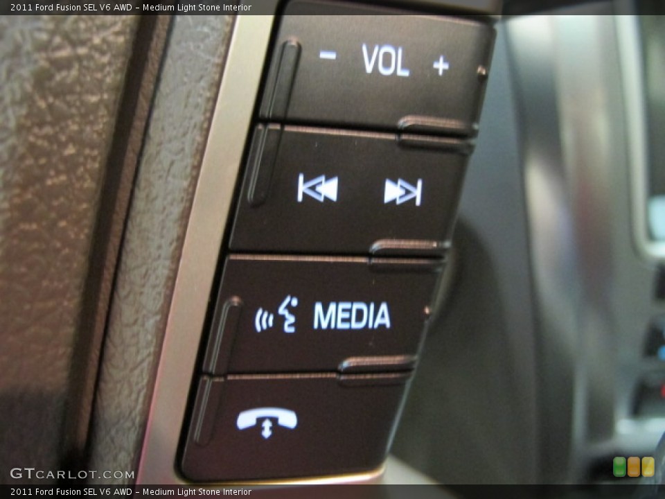 Medium Light Stone Interior Controls for the 2011 Ford Fusion SEL V6 AWD #67681177
