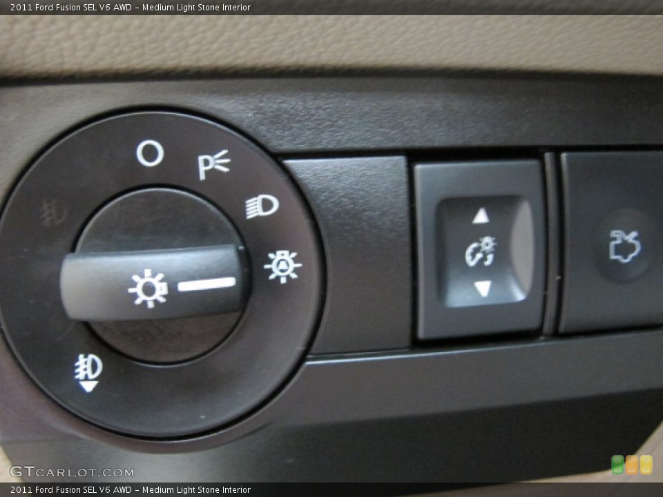 Medium Light Stone Interior Controls for the 2011 Ford Fusion SEL V6 AWD #67681183