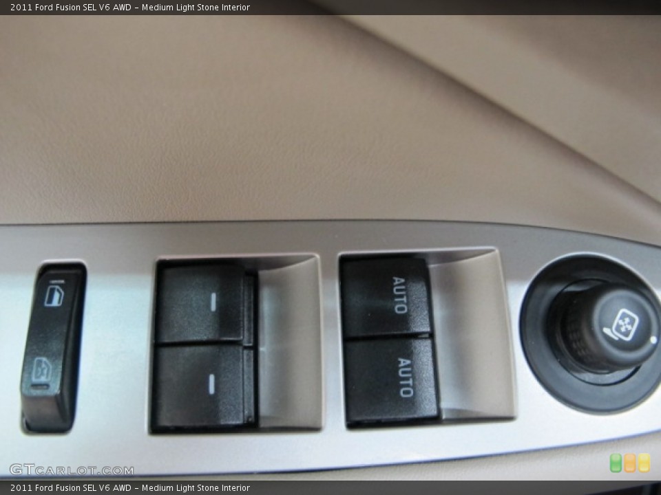 Medium Light Stone Interior Controls for the 2011 Ford Fusion SEL V6 AWD #67681207