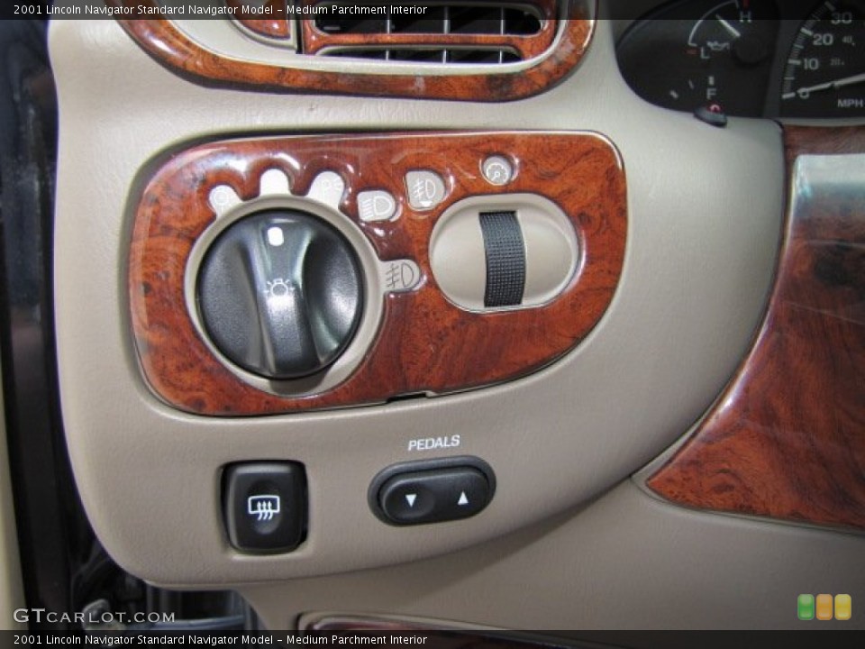 Medium Parchment Interior Controls for the 2001 Lincoln Navigator  #67695436