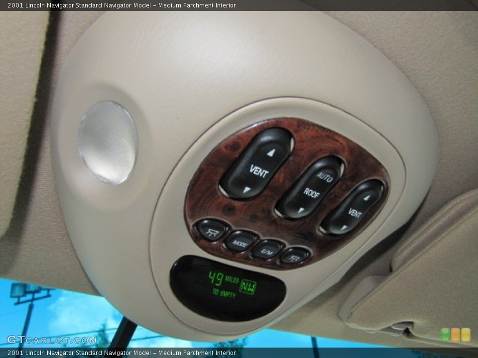 Medium Parchment Interior Controls for the 2001 Lincoln Navigator  #67695448