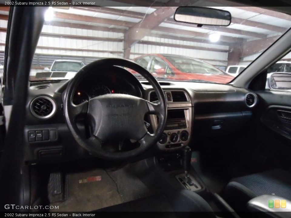 Black Interior Dashboard for the 2002 Subaru Impreza 2.5 RS Sedan #67735769