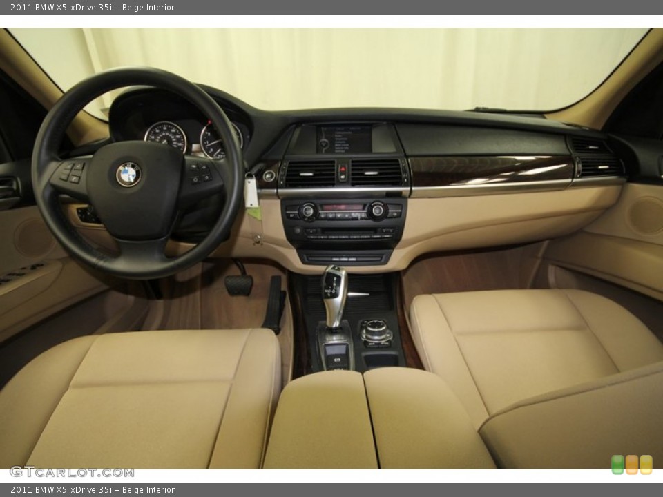 Beige Interior Dashboard for the 2011 BMW X5 xDrive 35i #67740152