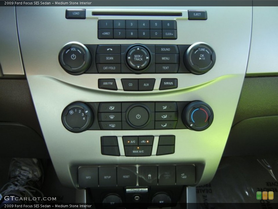 Medium Stone Interior Controls for the 2009 Ford Focus SES Sedan #67757579