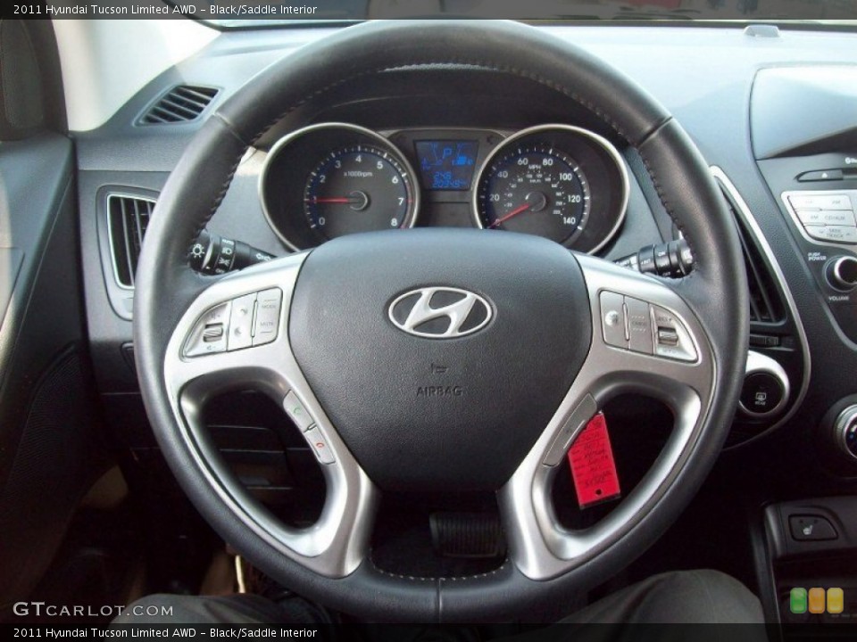Black/Saddle Interior Steering Wheel for the 2011 Hyundai Tucson Limited AWD #67768236