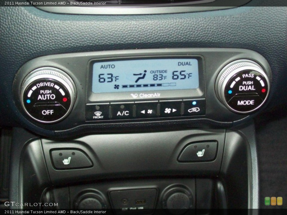 Black/Saddle Interior Controls for the 2011 Hyundai Tucson Limited AWD #67768251