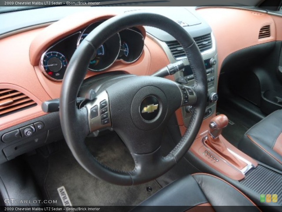 Ebony/Brick Interior Steering Wheel for the 2009 Chevrolet Malibu LTZ Sedan #67815918