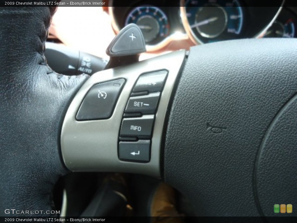 Ebony/Brick Interior Controls for the 2009 Chevrolet Malibu LTZ Sedan #67816026