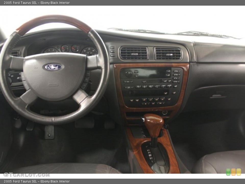 Ebony Black Interior Dashboard for the 2005 Ford Taurus SEL #67843088