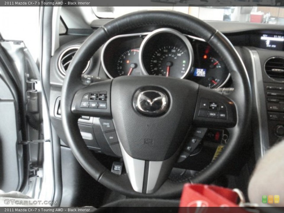 Black Interior Steering Wheel for the 2011 Mazda CX-7 s Touring AWD #67847706