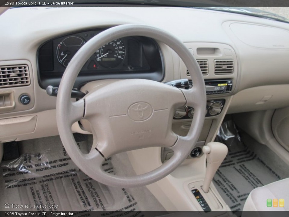Beige Interior Dashboard for the 1998 Toyota Corolla CE #67930985