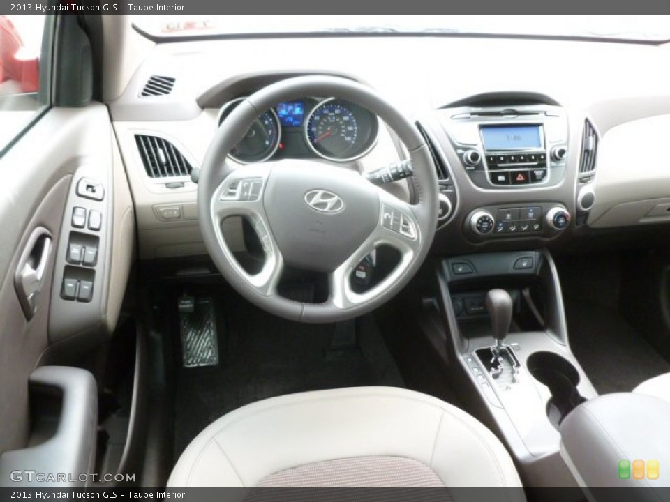 Taupe Interior Dashboard for the 2013 Hyundai Tucson GLS #67939492