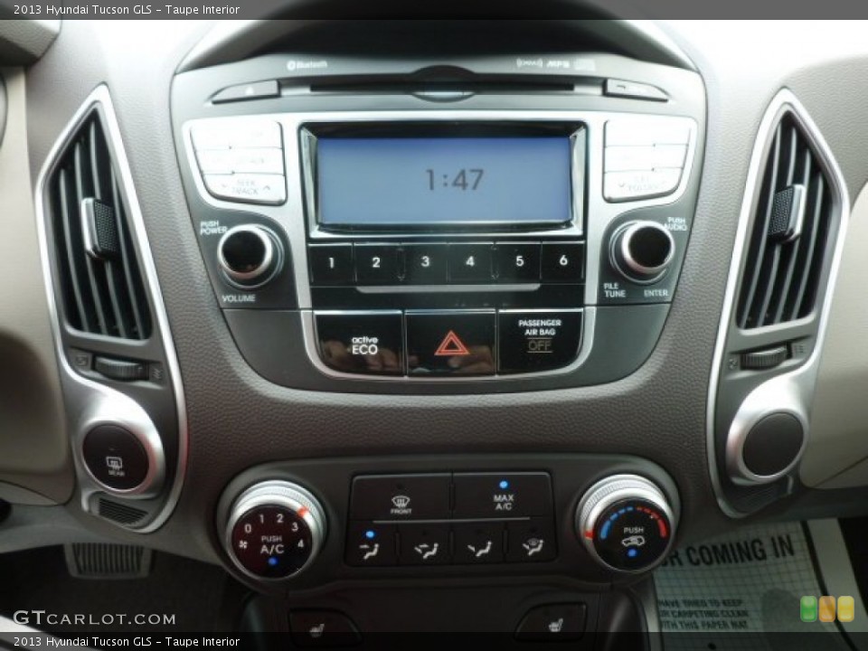 Taupe Interior Controls for the 2013 Hyundai Tucson GLS #67939523