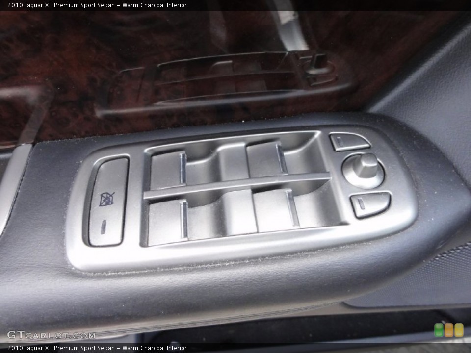 Warm Charcoal Interior Controls for the 2010 Jaguar XF Premium Sport Sedan #67948784