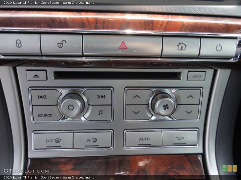 Warm Charcoal Interior Controls for the 2010 Jaguar XF Premium Sport Sedan #67949000
