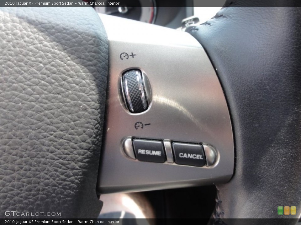 Warm Charcoal Interior Controls for the 2010 Jaguar XF Premium Sport Sedan #67949045