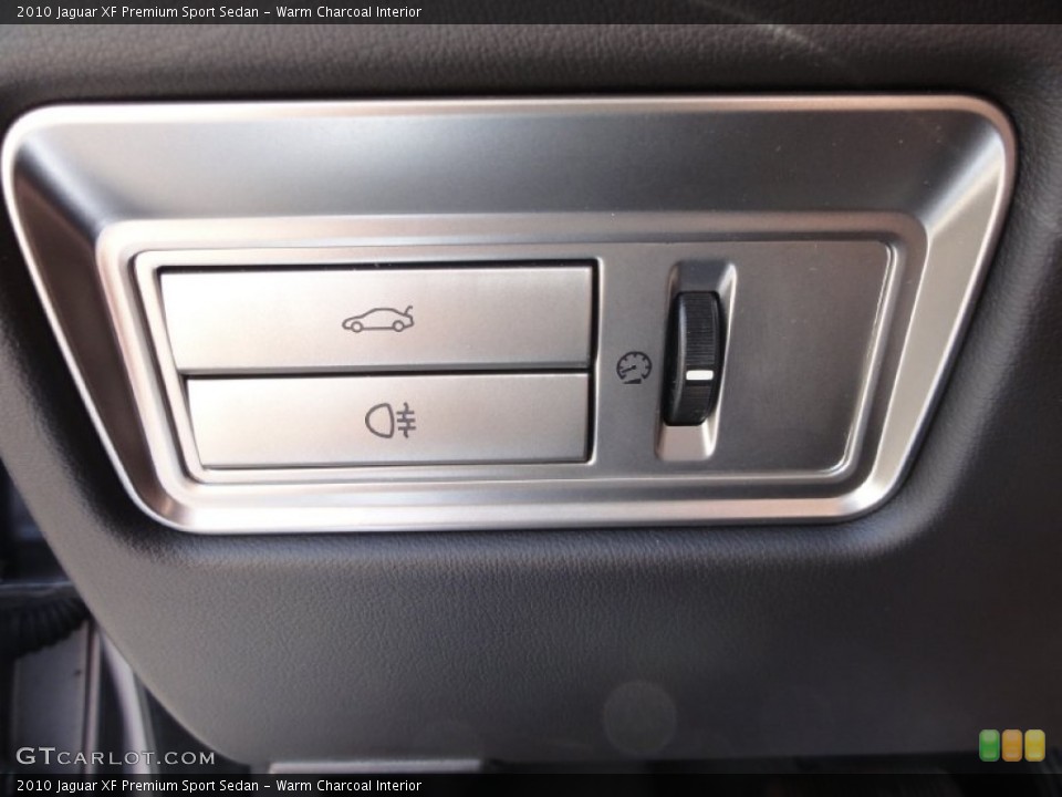 Warm Charcoal Interior Controls for the 2010 Jaguar XF Premium Sport Sedan #67949061
