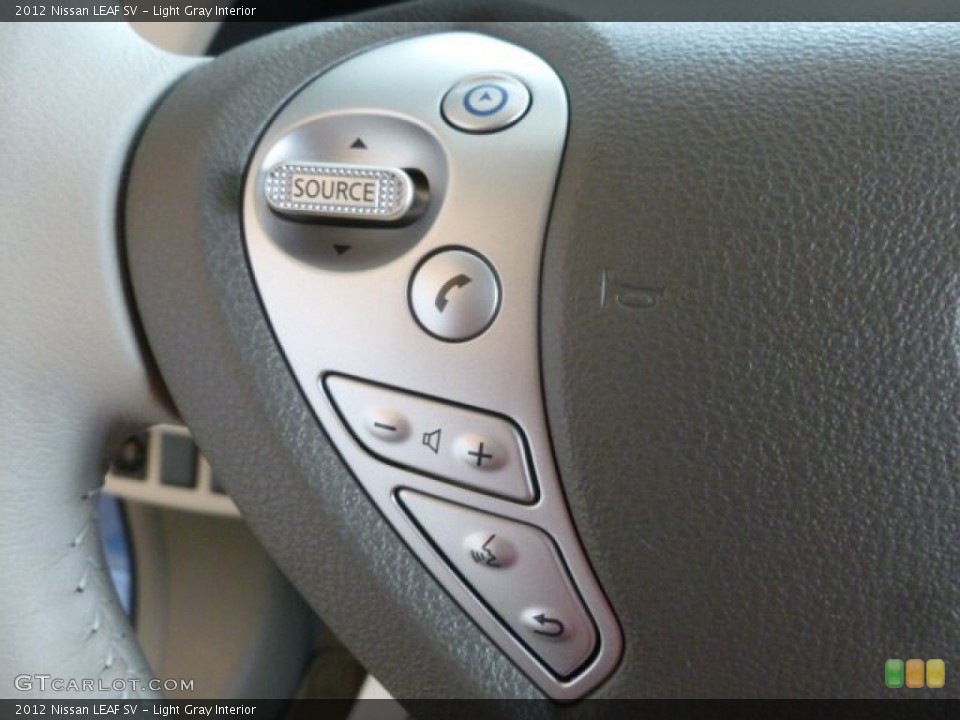 Light Gray Interior Controls for the 2012 Nissan LEAF SV #67957457