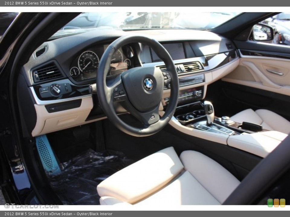 Oyster/Black Interior Prime Interior for the 2012 BMW 5 Series 550i xDrive Sedan #67979432