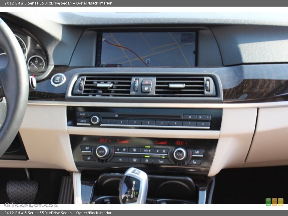 Oyster/Black Interior Controls for the 2012 BMW 5 Series 550i xDrive Sedan #67979465