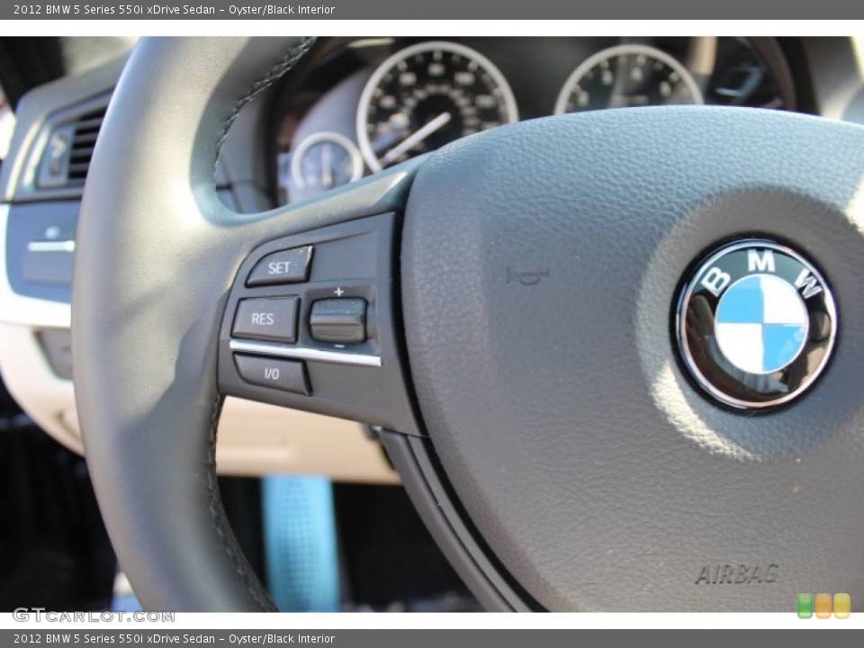 Oyster/Black Interior Controls for the 2012 BMW 5 Series 550i xDrive Sedan #67979492