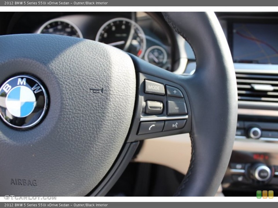 Oyster/Black Interior Controls for the 2012 BMW 5 Series 550i xDrive Sedan #67979501