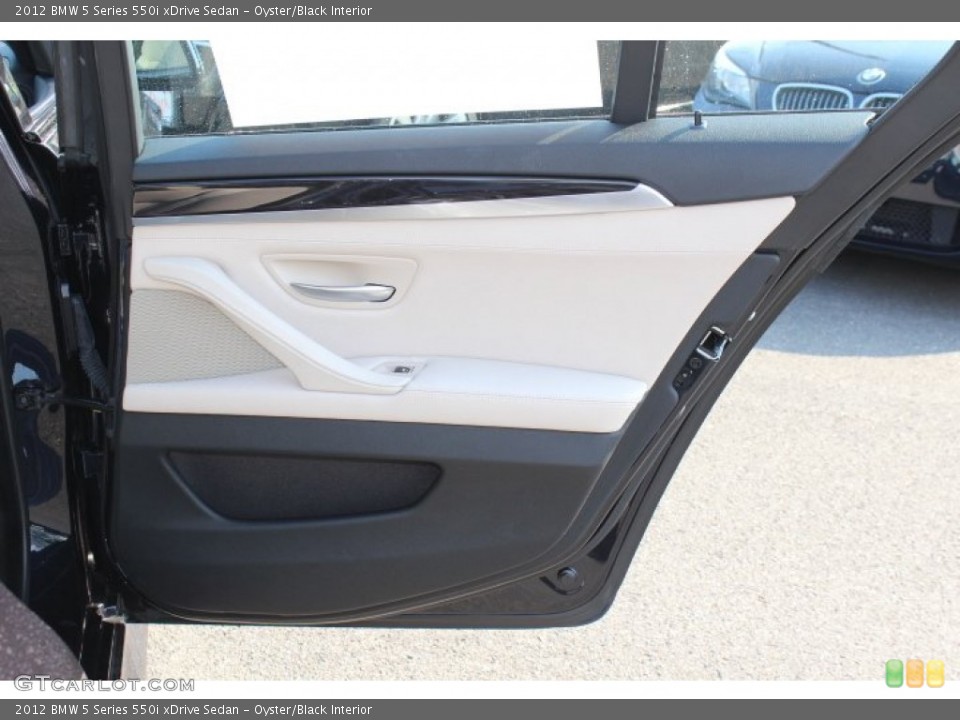Oyster/Black Interior Door Panel for the 2012 BMW 5 Series 550i xDrive Sedan #67979540