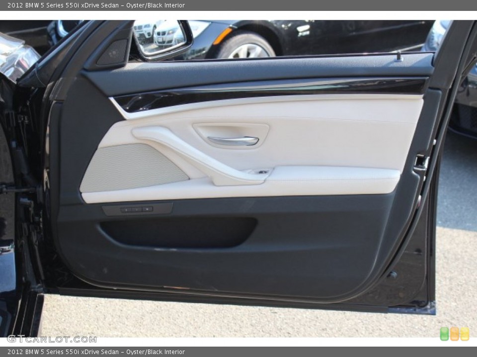 Oyster/Black Interior Door Panel for the 2012 BMW 5 Series 550i xDrive Sedan #67979552