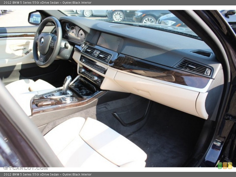 Oyster/Black Interior Dashboard for the 2012 BMW 5 Series 550i xDrive Sedan #67979558
