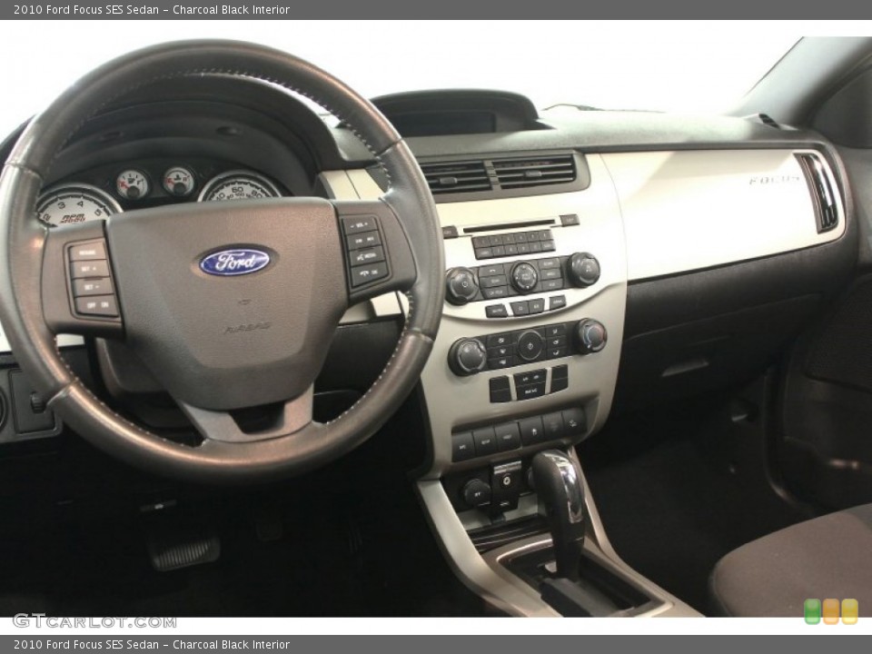 Charcoal Black Interior Dashboard for the 2010 Ford Focus SES Sedan #68011742