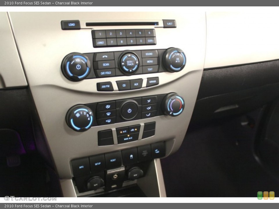 Charcoal Black Interior Controls for the 2010 Ford Focus SES Sedan #68011766