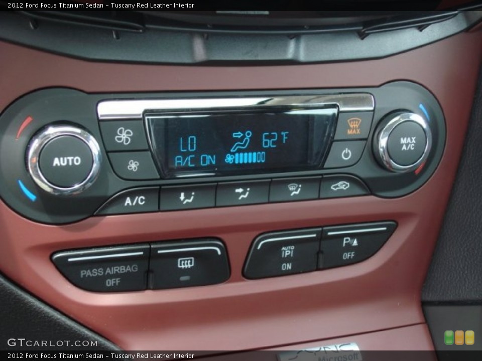 Tuscany Red Leather Interior Controls for the 2012 Ford Focus Titanium Sedan #68014561