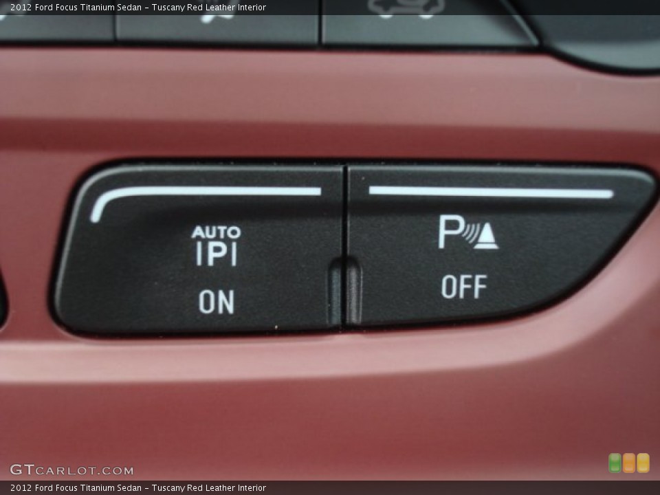 Tuscany Red Leather Interior Controls for the 2012 Ford Focus Titanium Sedan #68014573