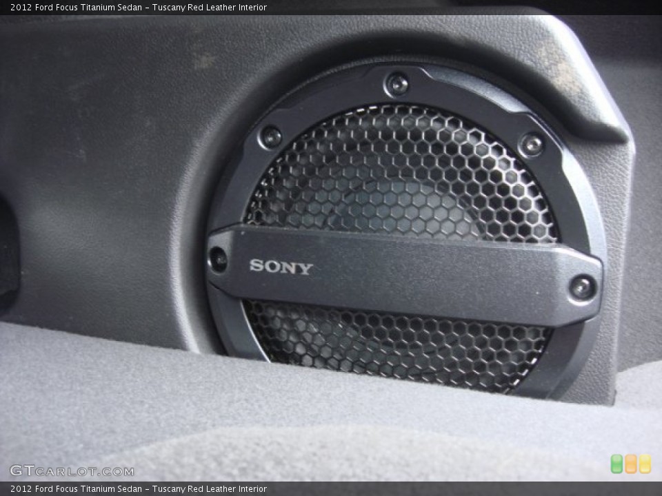 Tuscany Red Leather Interior Audio System for the 2012 Ford Focus Titanium Sedan #68014654