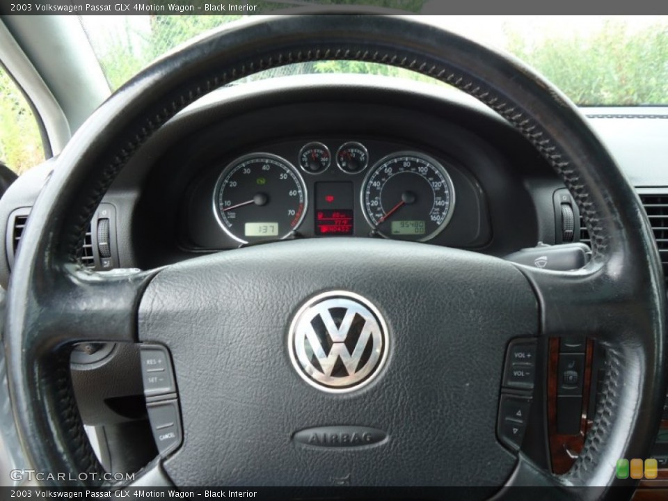 Black Interior Steering Wheel for the 2003 Volkswagen Passat GLX 4Motion Wagon #68047786