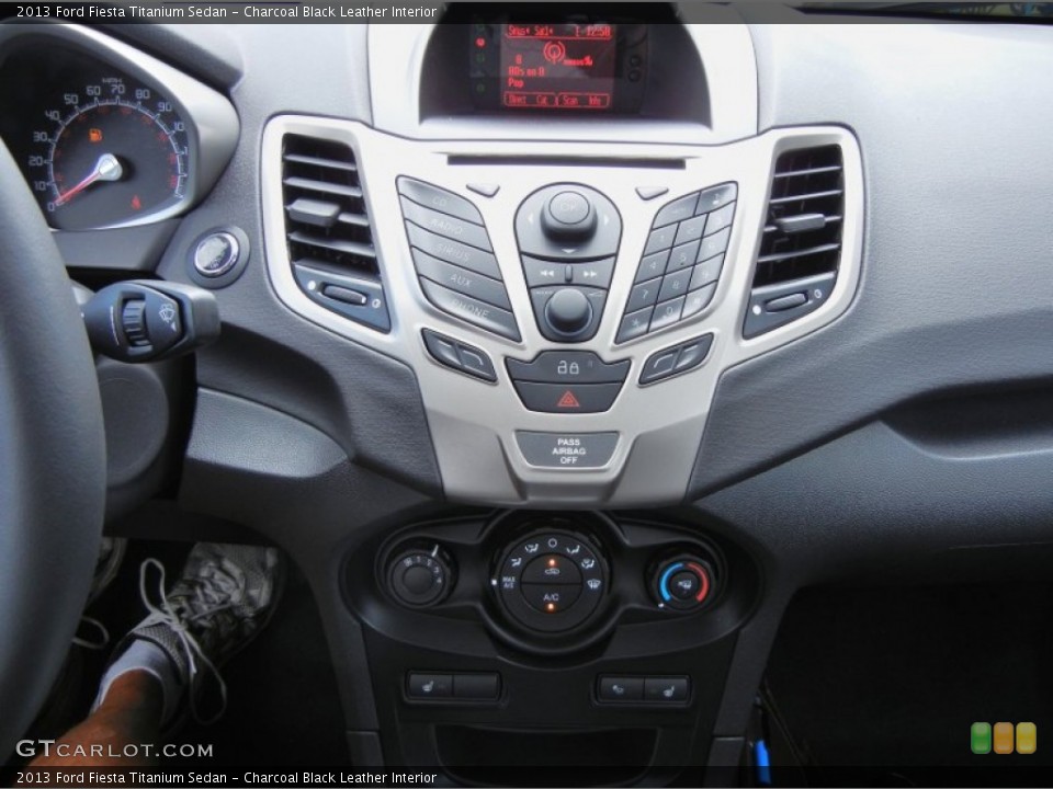 Charcoal Black Leather Interior Controls for the 2013 Ford Fiesta Titanium Sedan #68096900