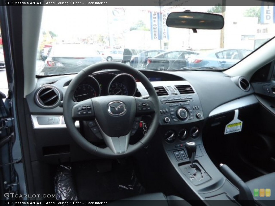 Black Interior Dashboard for the 2012 Mazda MAZDA3 i Grand Touring 5 Door #68102480