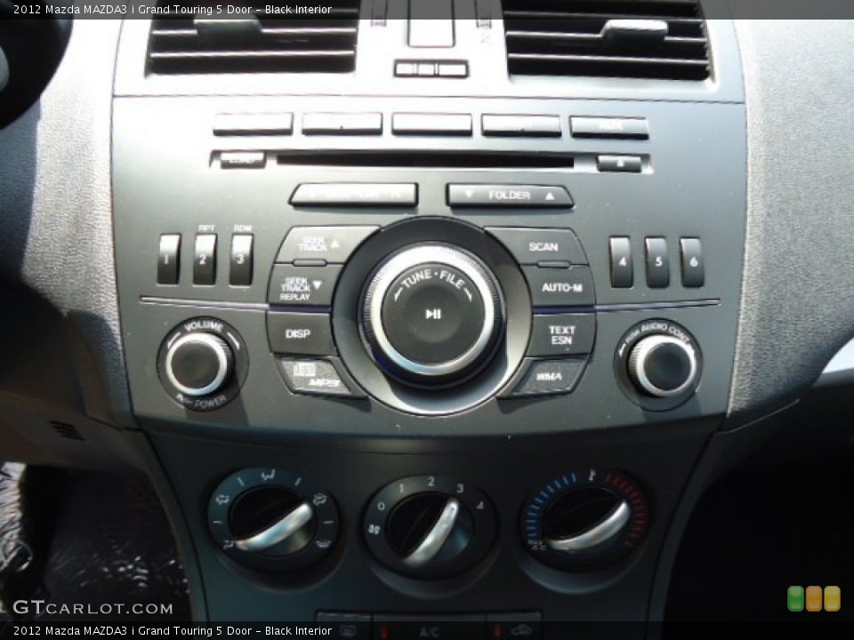 Black Interior Controls for the 2012 Mazda MAZDA3 i Grand Touring 5 Door #68102540